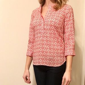 Red patterned blouse